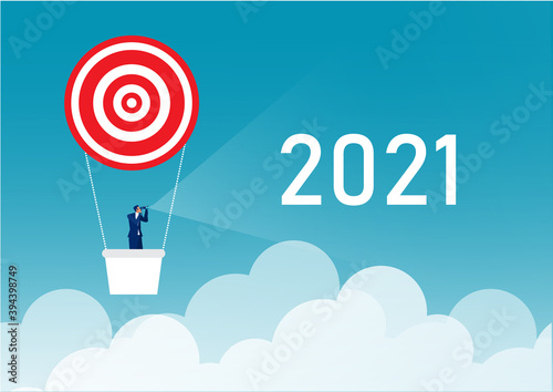 businessman looking in telescope seeing 2021 of year future on the balloon. design vector illustrator