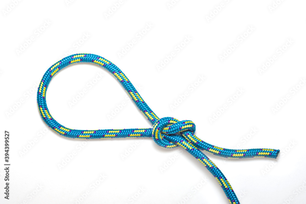 Noose knot forming a loop at the end of a rope on a white background