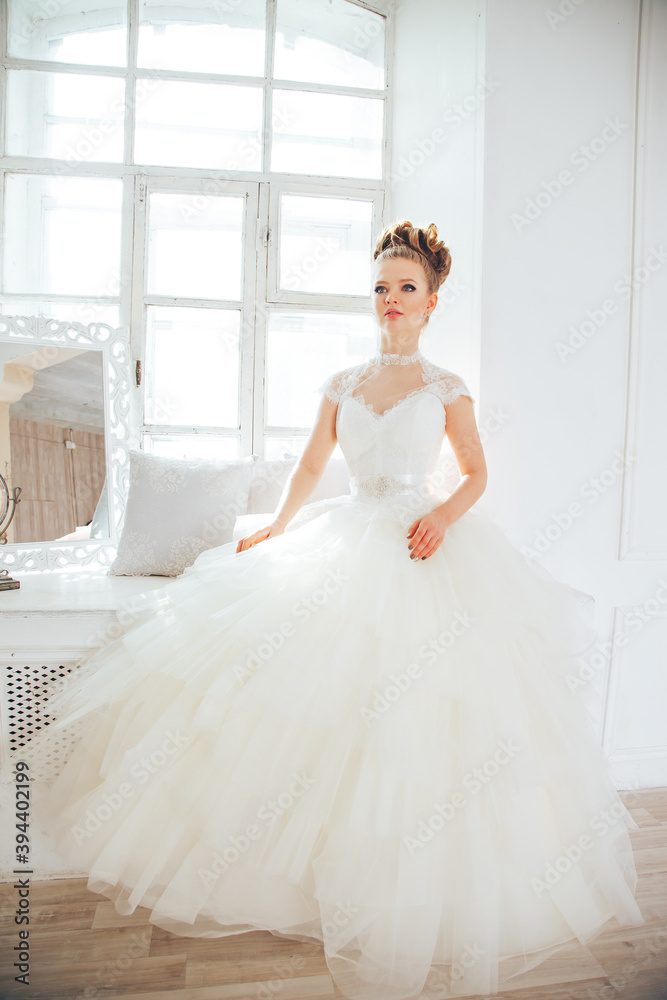 Wedding day and beautiful bride in studio. Beautiful young bride with wedding makeup and hairstyle. Closeup portrait of young gorgeous bride. Wedding day and beautiful bride in studio. Beautiful young bride with wedding makeup and hairstyle. Closeup portrait of young gorgeous bride.