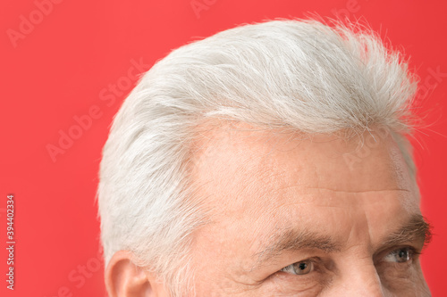 Senior man with grey hair o...