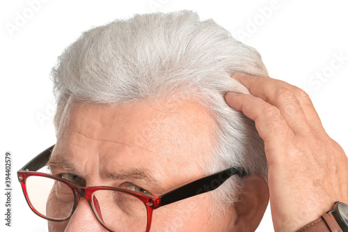 Senior man with grey hair o...