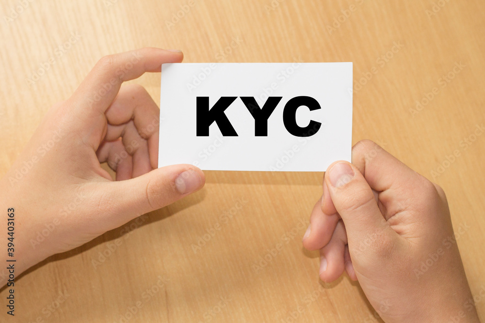 KYC - Know Your Customer. Card with text KYC on hand. You can use in business, finance , marketing and other concepts. KYC - Know Your Customer. Card with text KYC on hand. You can use in business, finance , marketing and other concepts.