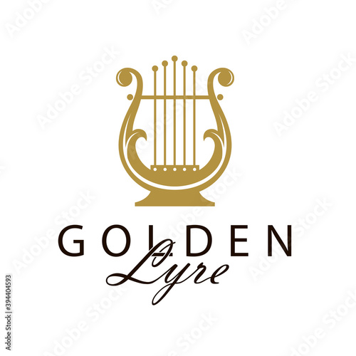 golden ancient lyre icon isolated on white background photo