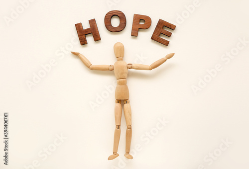 Wooden mannequin with word ...