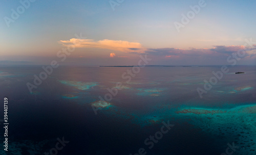 Aerial view Banyak Islands Sumatra tropical archipelago Indonesia, coral reef white sand beach. Top travel tourist destination, best diving snorkeling. Sunset sky