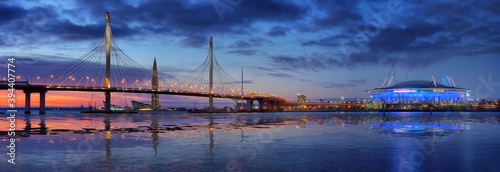 Panorama with cable-stayed bridge and stadium on the background of the Neva river in Saint Petersburg