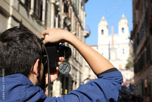 photographer taking a souvenir photo in Rome Capital of Italy