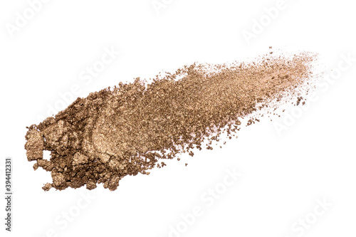 Eyeshadow sample isolated on white background. Crushed brown metallic eyeshadow. Closeup of a makeup product.