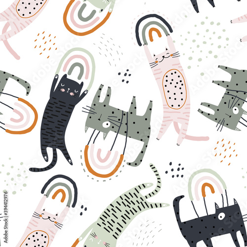 Seamless childish pattern with flying on rainbows cats. Creative kids hand drawn texture for fabric, wrapping, textile, wallpaper, apparel. Vector illustration