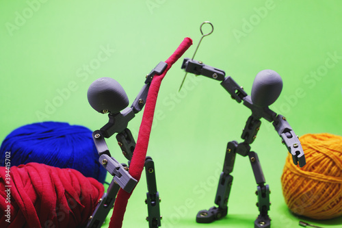 Foto Articulated dolls sewing something new