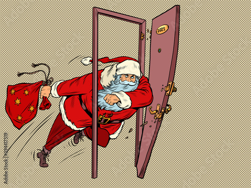 Santa Claus is kicking down the door in 2021. New year and Christmas