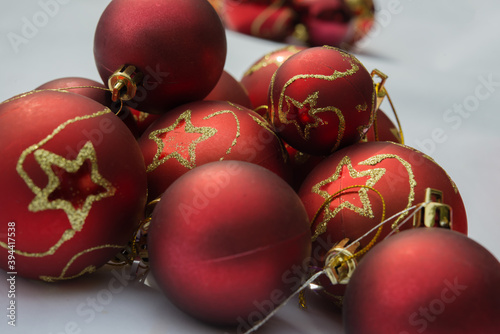 Christmas toys for the Christmas tree and new year  beautiful red and gold balls isolated on the white background.