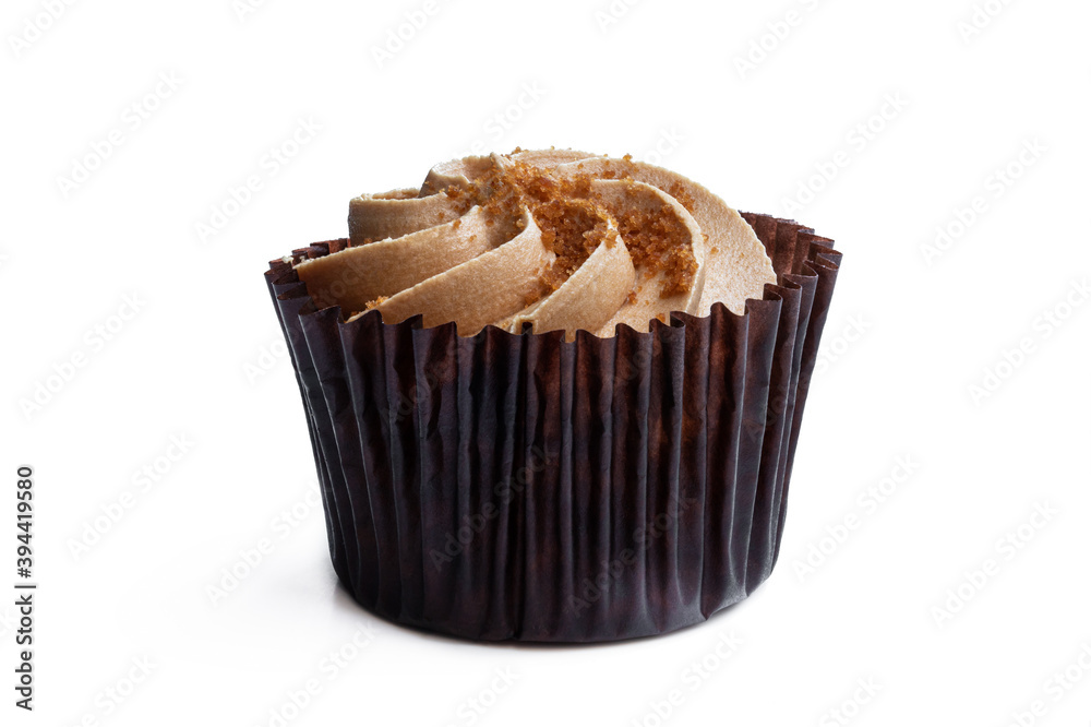 Mini cupcake with caramelised cream and crumb isolated on white Mini cupcake with caramelised cream and crumb isolated on white