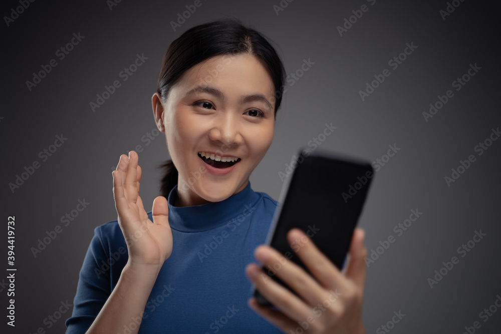 Asian woman happy video call on smart phone. Asian woman happy video call on smart phone.