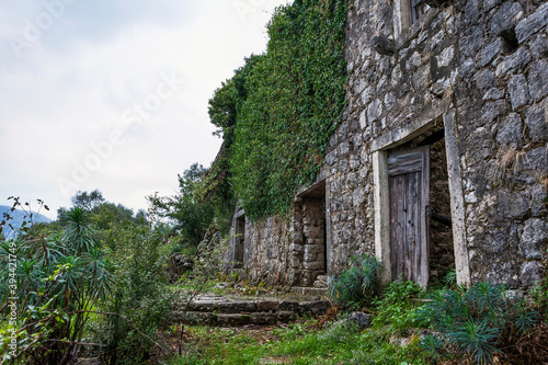 Fotografie, Obraz Ruined house in Gornji Stoliv, a largely abandoned village high above the Bay of