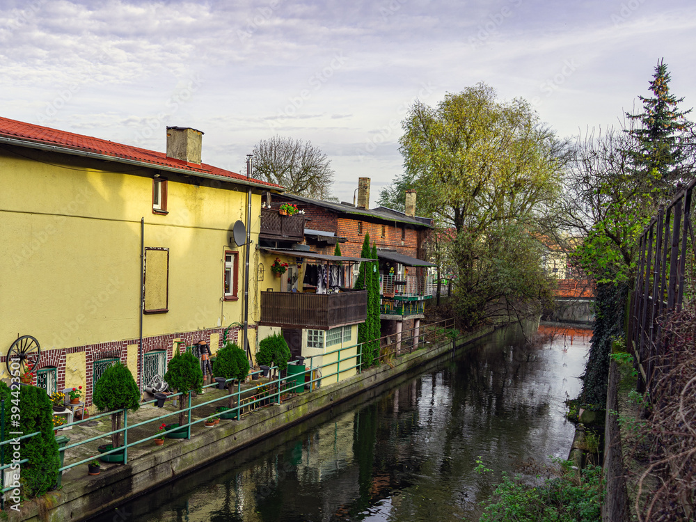 small houses in the city with a water canal