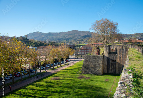 Muralla de Hondarribia con un prado debajo y buen tiempo. Basque country. 