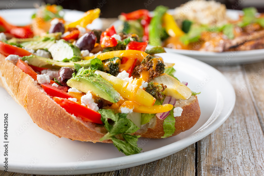 A view of a Mediterranean vegetarian hero sandwich. A view of a Mediterranean vegetarian hero sandwich.