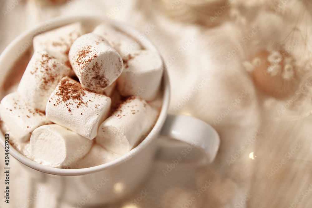 Cup of hot chocolate with marshmallow and christmas decorations. Winter cozy home concept Cup of hot chocolate with marshmallow and christmas decorations. Winter cozy home concept