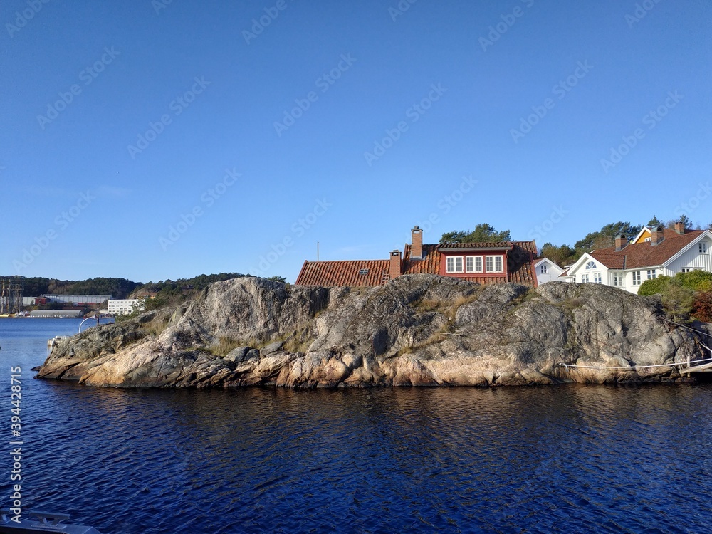 View on landscape near Hollen village bay at summer autumn weather, Norway