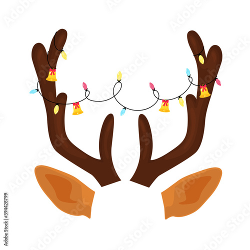 Reindeer antlers with Christmas light garland and bells. Funny selfie photo mask