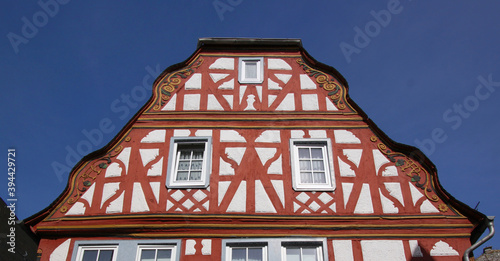 Half-timbered wooden gable construction on a residential house in the old town of Diez in Germany