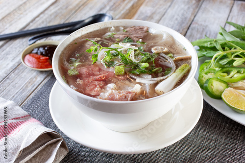 A view of a bowl of beef pho.