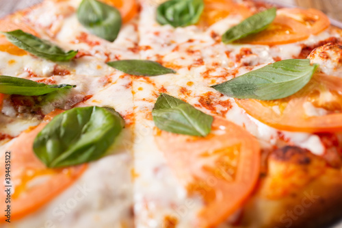 A closeup view of a Margherita pizza.