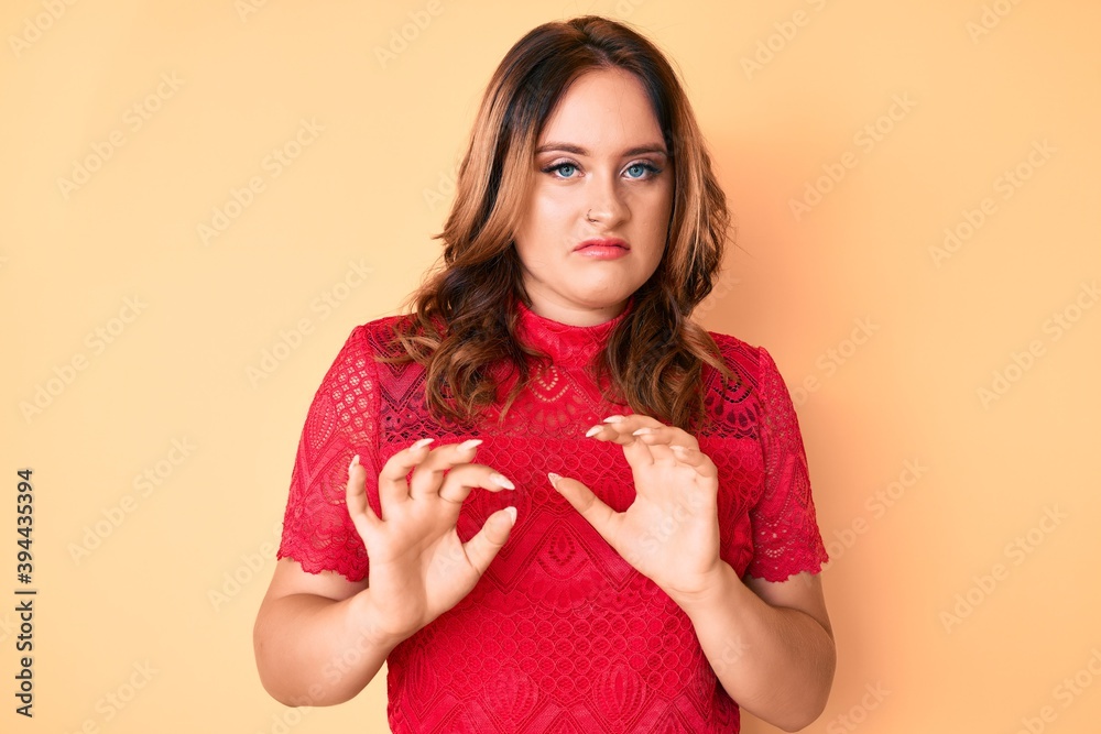 Young beautiful caucasian woman wearing casual clothes disgusted expression, displeased and fearful doing disgust face because aversion reaction. with hands raised Young beautiful caucasian woman wearing casual clothes disgusted expression, displeased and fearful doing disgust face because aversion reaction. with hands raised