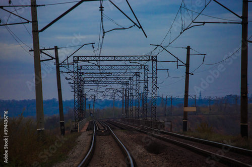 Railway double-track bridge in cloudy weather photo