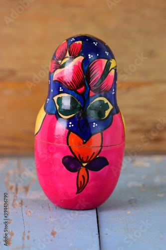 painted eggs on wooden background