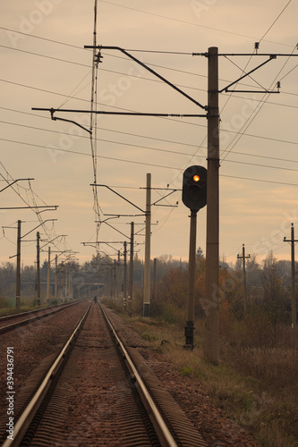 Railroad with red traffic light signal