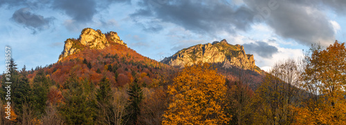 Autumn rural landscape with mountains peaks on background. The Vratna valley in Mala Fatra national park, Slovakia, Europe. photo