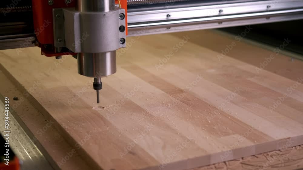 Drill the circle in motion on the board installed in the cnc wood ...