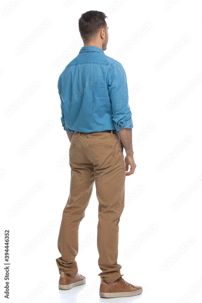 Fototapeta premium casual guy just standing and looking at something
