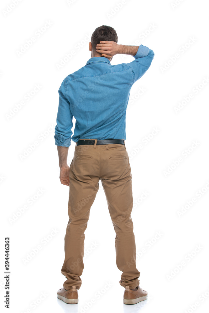 Fototapeta premium casual guy scratching his head and feeling lost