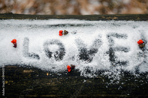 lettering love in the snow with bright colors.declaration of love