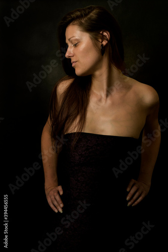 Fashion photo of the beautiful woman on dark background