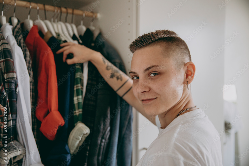 Woman choosing clothes, Sweden Woman choosing clothes, Sweden