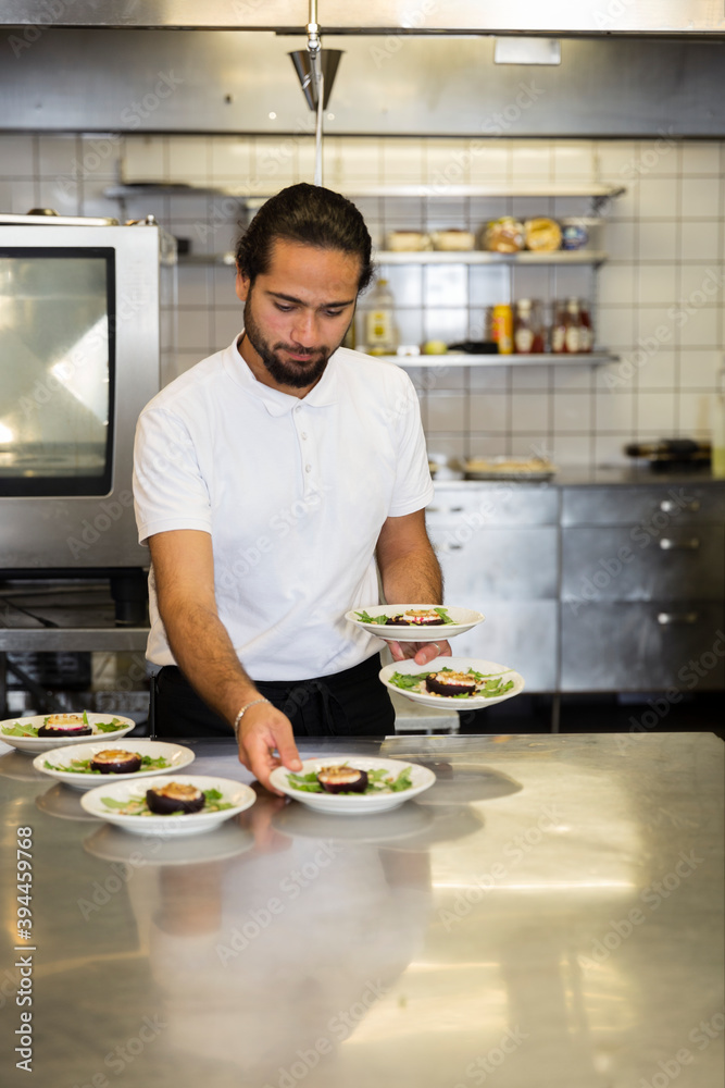 Chef working in kitchen, Sweden Chef working in kitchen, Sweden
