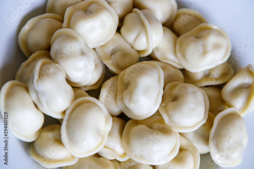 Boiled dumplings on a white plate