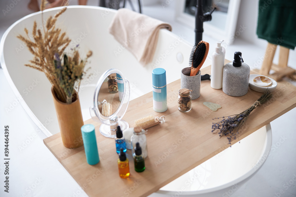Face care bottles on wooden counter table Face care bottles on wooden counter table