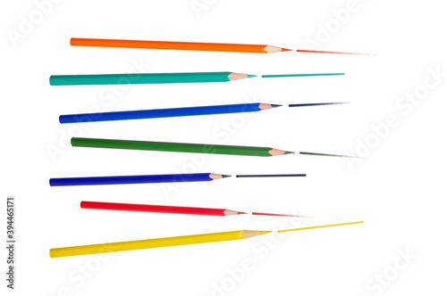 Sharpcoloured pencils. Drawn lines. Colour probe with different pressure forces. All rainbow colors. Isolated on white background at different angles.