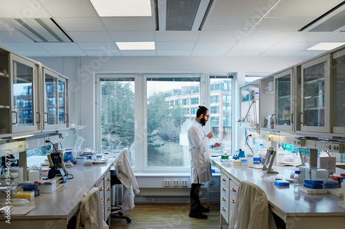 Scientist working in laboratory, Sweden photo