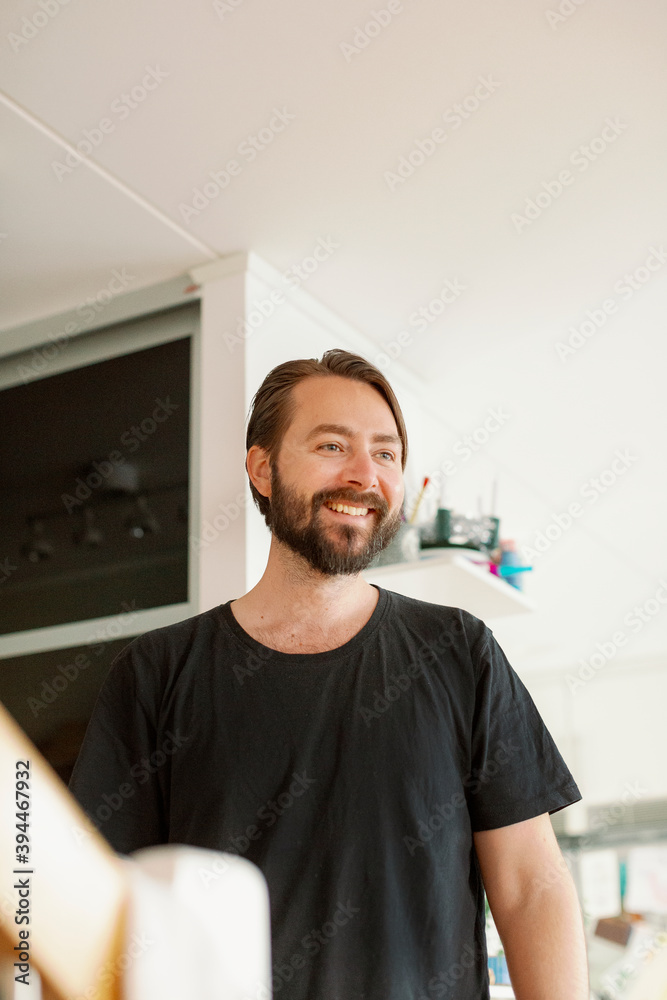 Smiling man looking away, Sweden Smiling man looking away, Sweden