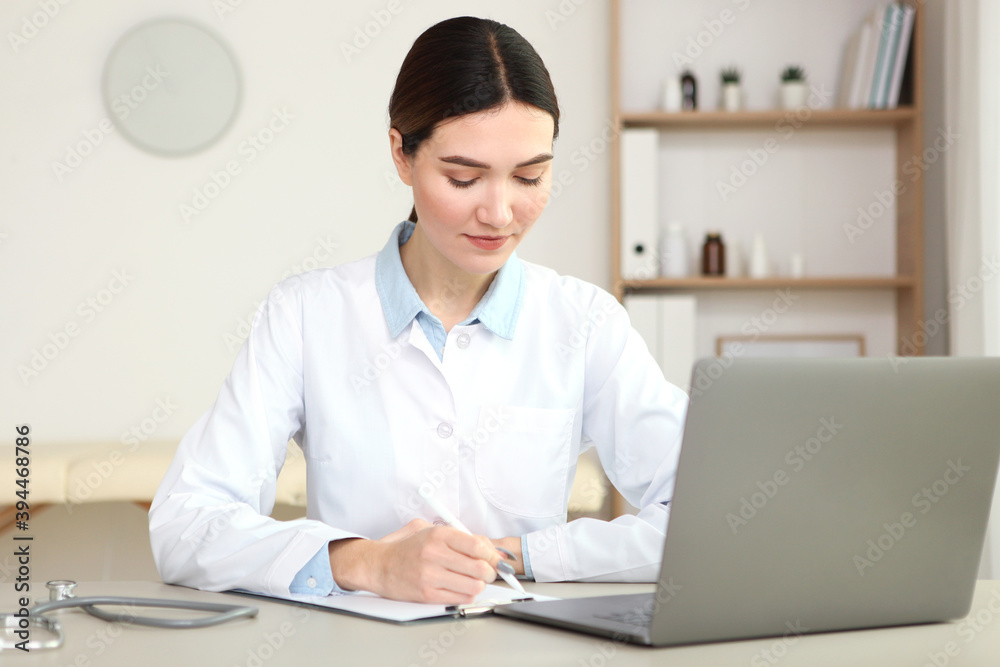 young woman doctor in the interior of the office young woman doctor in the interior of the office