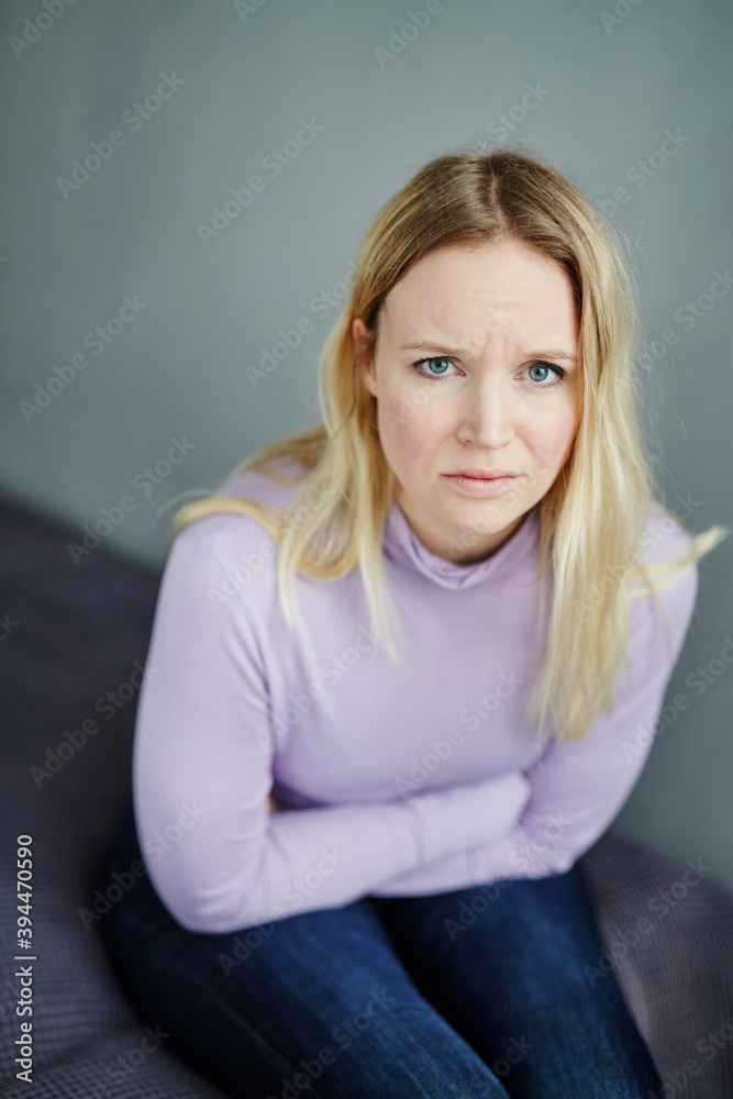 Sad woman looking at camera, Sweden Sad woman looking at camera, Sweden