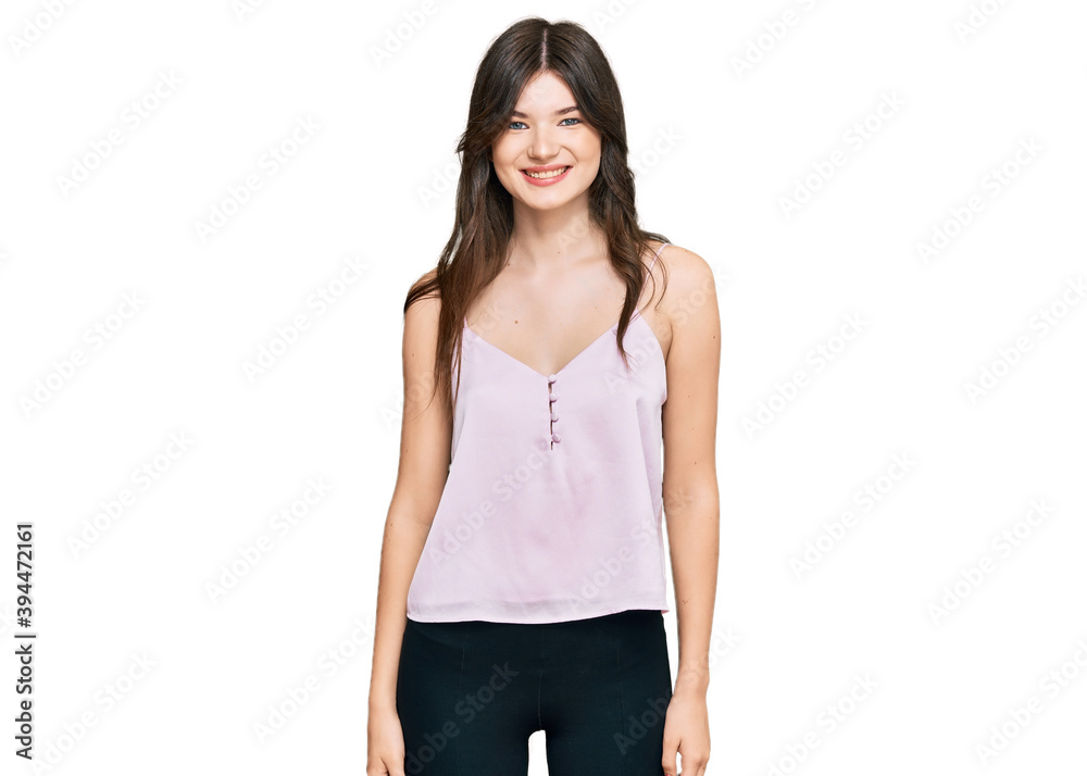 Young beautiful caucasian girl wearing casual clothes with a happy and cool smile on face. lucky person. Young beautiful caucasian girl wearing casual clothes with a happy and cool smile on face. lucky person.