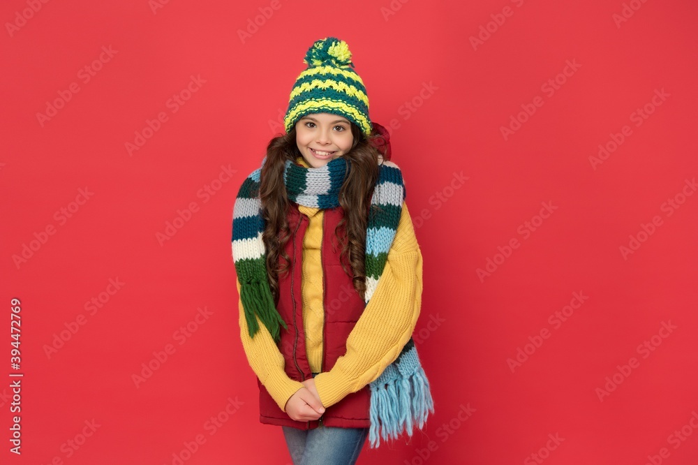 kid with happy face wearing warm winter clothing and get ready for holidays, vacation time