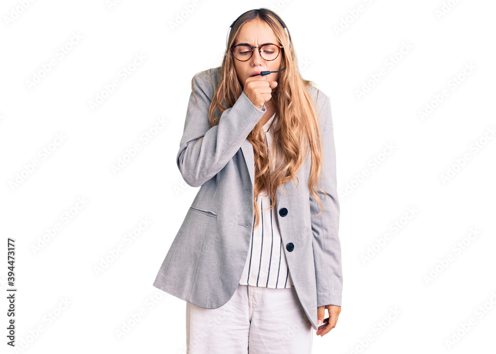 Young beautiful blonde woman wearing call center agent headset feeling unwell and coughing as symptom for cold or bronchitis. health care concept. Young beautiful blonde woman wearing call center agent headset feeling unwell and coughing as symptom for cold or bronchitis. health care concept.